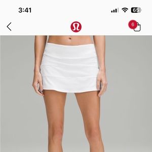 Used like new white camo pace rival mid rise skirt. Lululemon size 6.